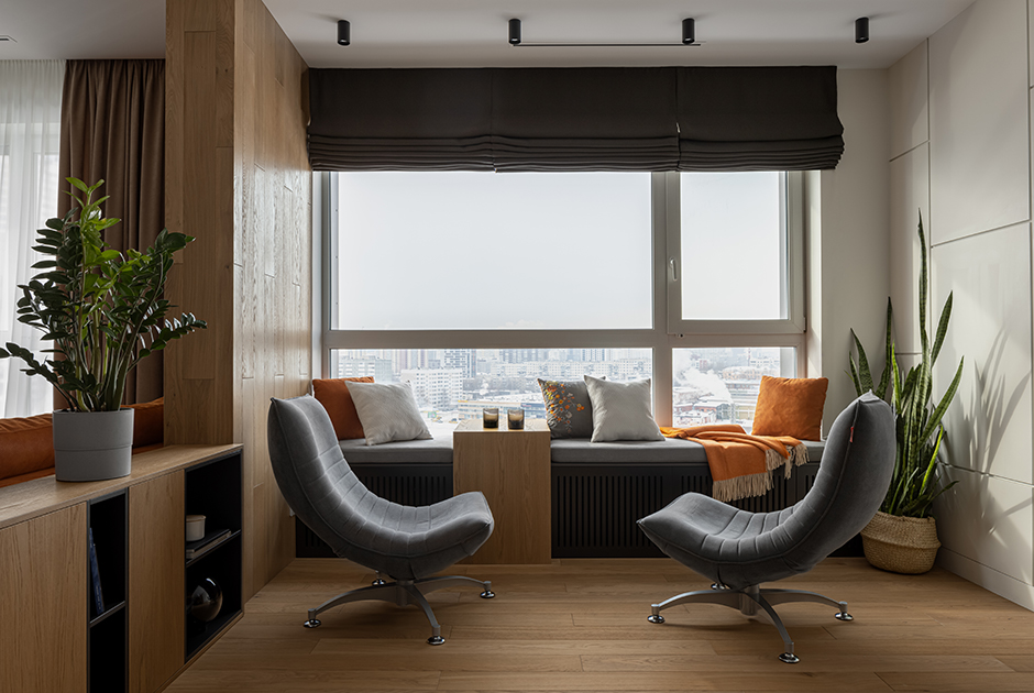 Квартира с круговой планировкой и оранжевыми акцентами